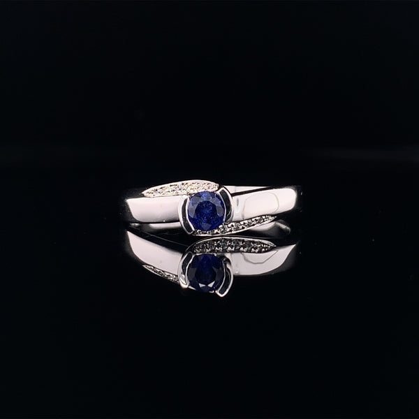 blue sapphire diamond twist ring