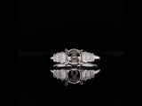 white gold engagement ring with emerald cut side diamonds video