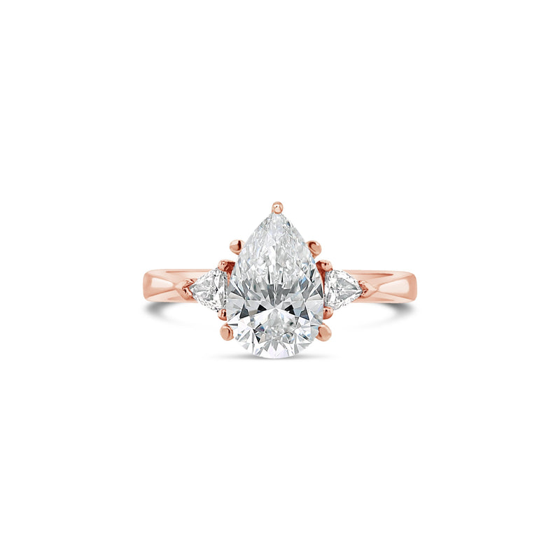 Pear Cut Lab Grown Diamond Engagement Ring With Trillion Side Diamonds