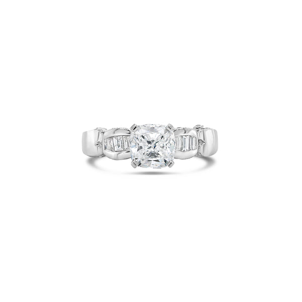 baguette diamond engagement ring with cushion cut centre diamond