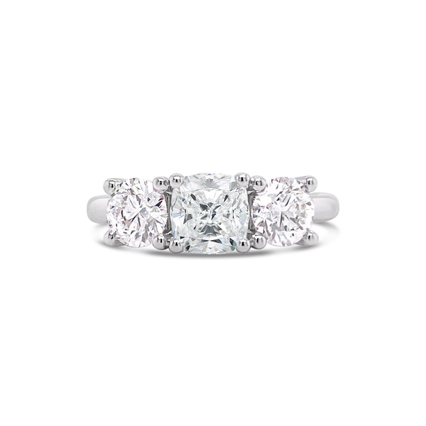 Cushion cut deals 3 stone ring