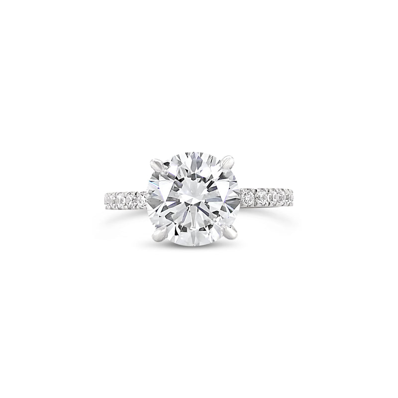 Four prong pavé setting engagement ring