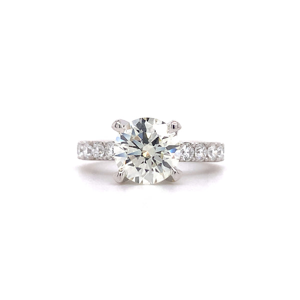 Four prong diamond engagement ring