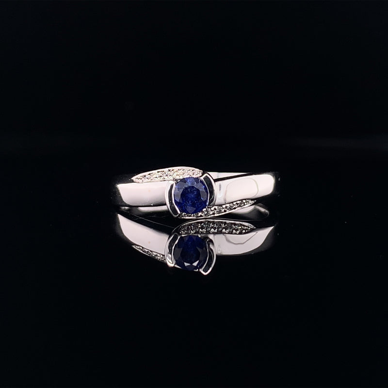 blue sapphire diamond twist ring