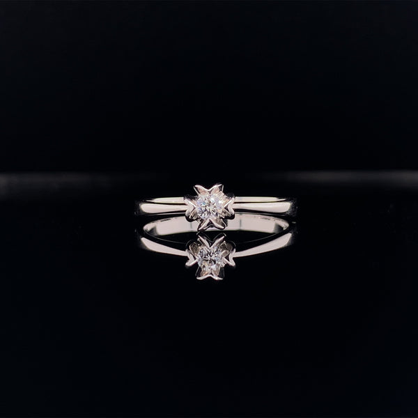 four petal diamond ring