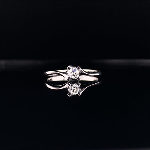 four twist prong diamond ring