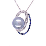 Sapphire Diamond And Pearl Halo Pendant