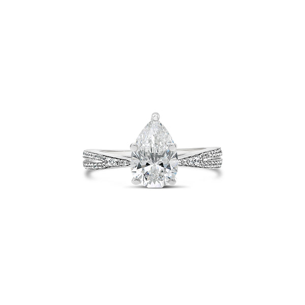 Pear cut diamond engagement ring with tapered band