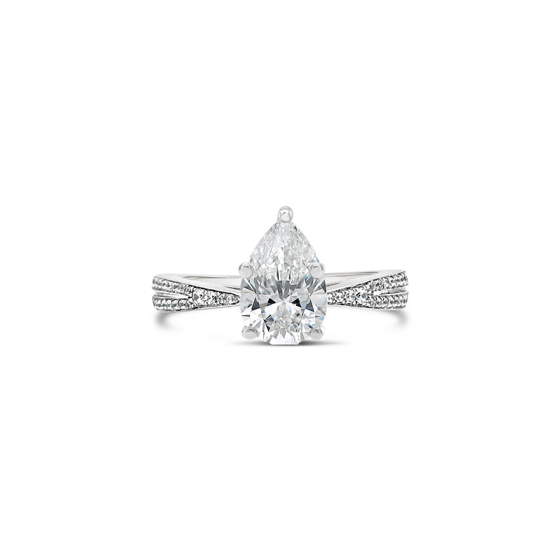 Pear cut diamond engagement ring with tapered band