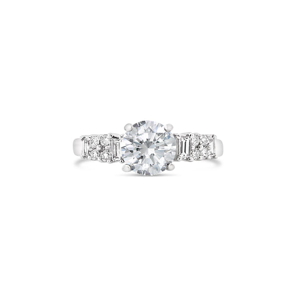 white gold diamond ring with baguette and round brilliant diamonds