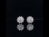 18k white gold diamond sunflower earrings video