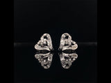 18k white gold diamond heart earrings video