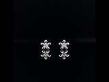 18k white gold diamond floral earrings video