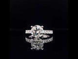 Four prong diamond engagement ring